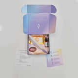 Altyr Toolkit: Attract Love box with simple aura colored design including Boundless Love Heart Elixir Herbal Tincture, Ceremonial Grade Cacao, Rhodonite Gemstone, Palo Santo and Smudging Feather