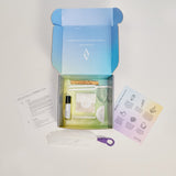 Altyr Toolkit: Manifest Now box with simple aura colored design including Clear Quartz Crystal, Tuning Fork 512 Hz, Palo Santo and Smudging Feather, I WILL Herbal Tea, Clarity Organic Essential Oil Roller, and Release papers