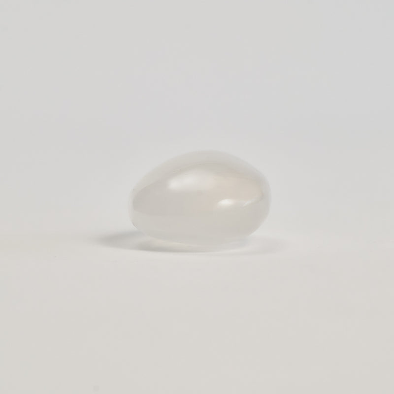 Clear Quartz stone on a white floor