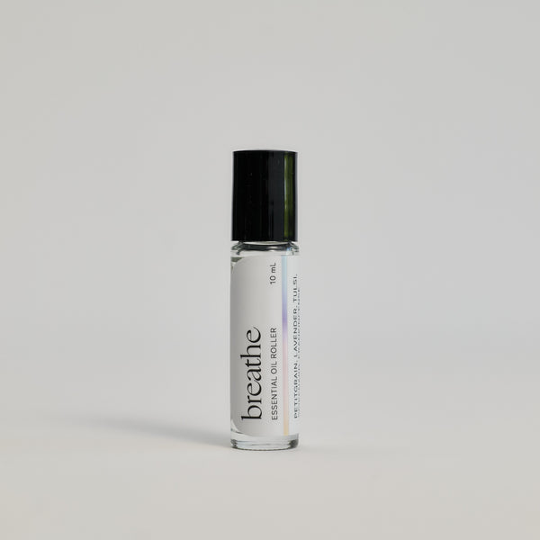 Breathe Essential Oil Roller package on a white floor