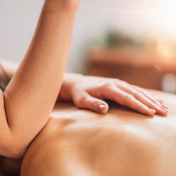 A person getting a massage with a blurry background